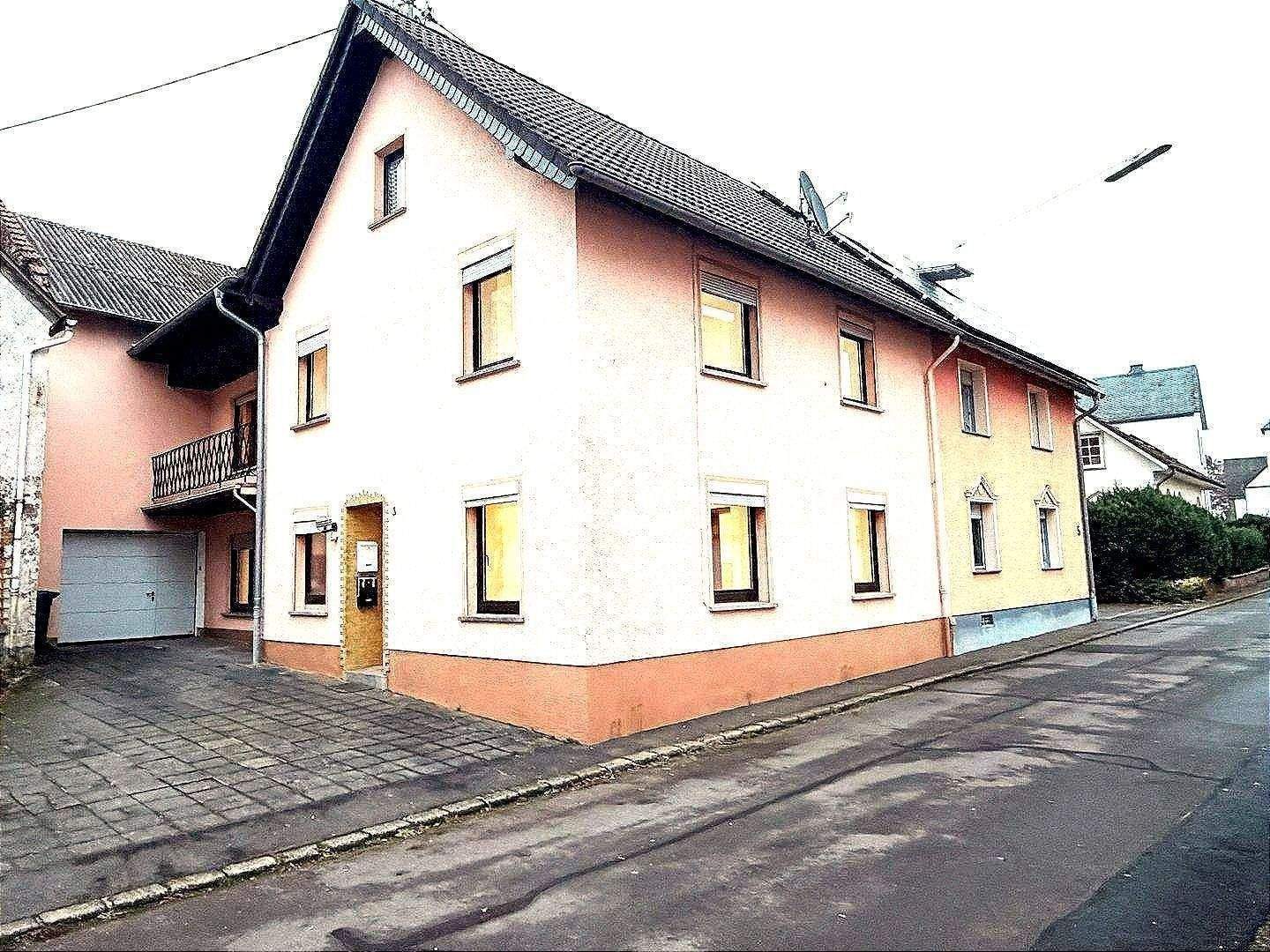 Charmantes Einfamilienhaus mit Garage, Scheune und zusätzlichem Gartengrundstück in Großlittgen – Großlittgen – Bild 1 von 9