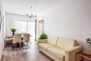 AIGNER - Erbbaurecht: Charmante 1,5-Zimmer-Wohnung mit Balkon und Tiefgaragenstellplatz