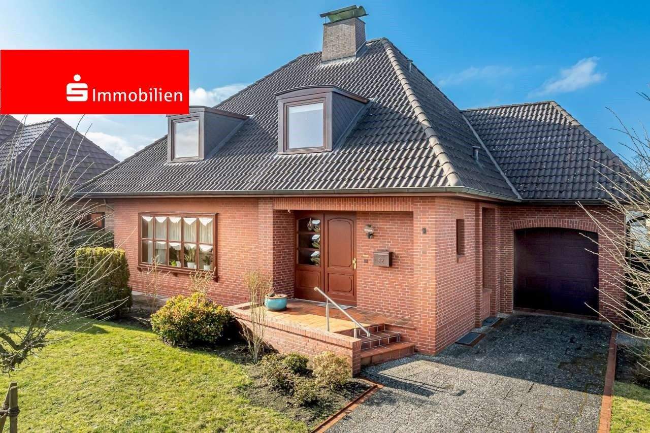 Gepflegtes Einfamilienhaus mit Vollkeller und Garage in ruhiger Wohnlage von Elmshorn – Elmshorn – Bild 1 von 9