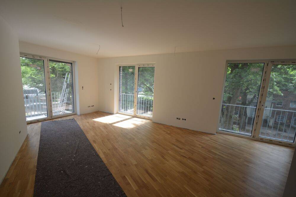 Stilvolle Eigentumswohnung im 1. Obergeschoss mit Balkon