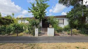 Familienglück auf einer Ebene - Bungalow mit großem, sichtgeschütztem Garten & Garage in WÜ-Heuchelhof