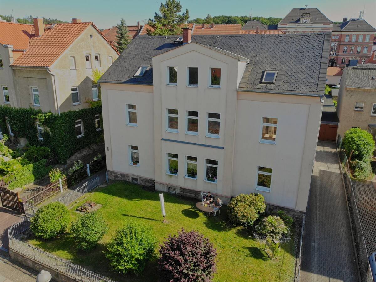 Mehrfamilienhaus zur Kapitalanlage, Teilsanierung notwendig! Teilvermietet, BV für Balkone positiv! – Nossen – Bild 1 von 9