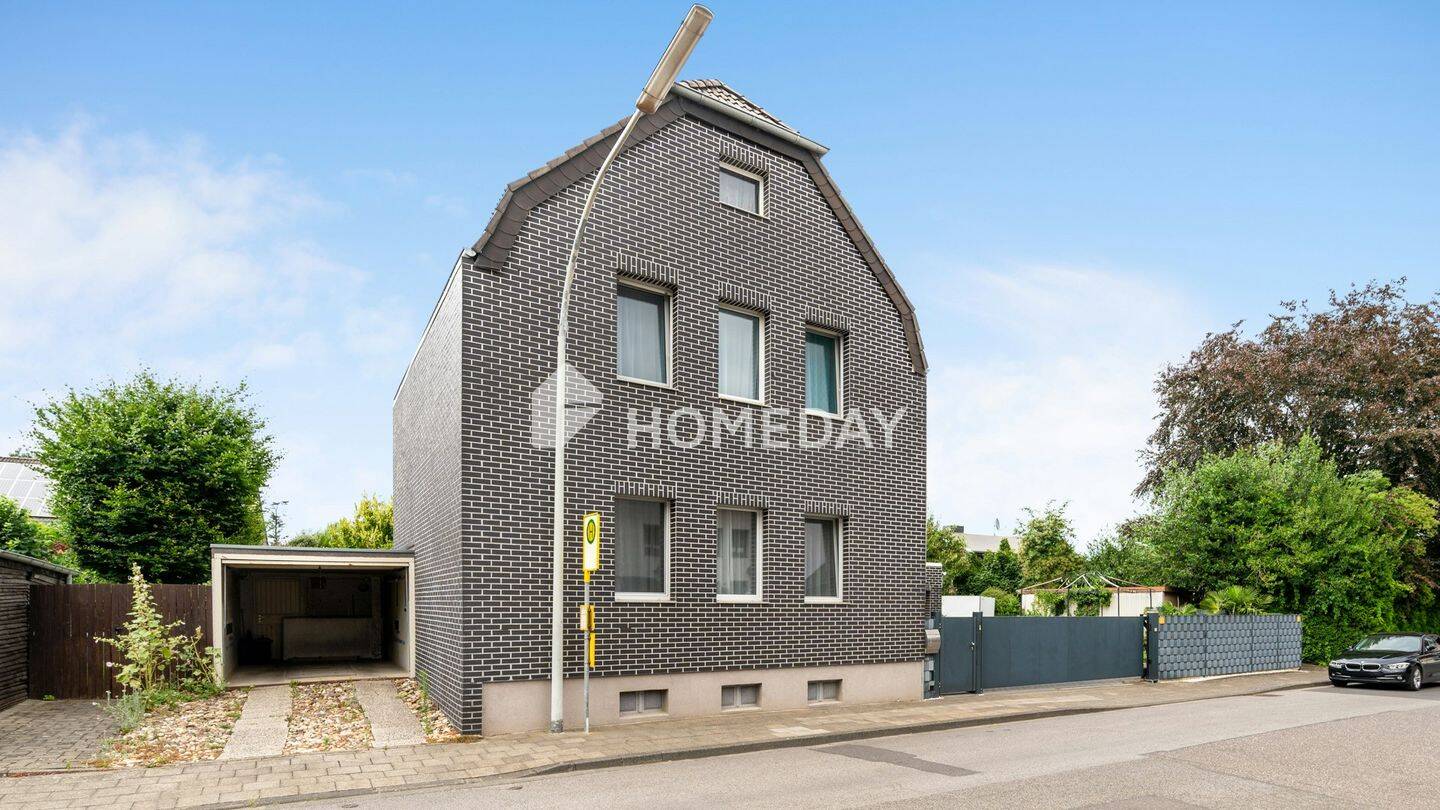 Modernisiertes Familienglück mit Garage, Garten, Terrasse und Einbauküche in Beckrath