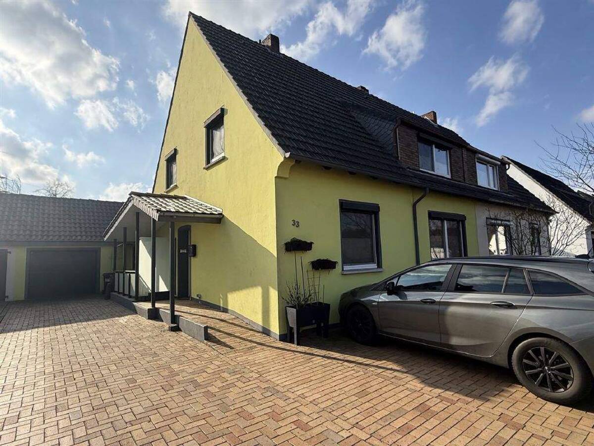 Familienfreundliche Doppelhaushälfte mit Garten, Garage und idealer Raumaufteilung – 28777 Bremen – Bild 1 von 9