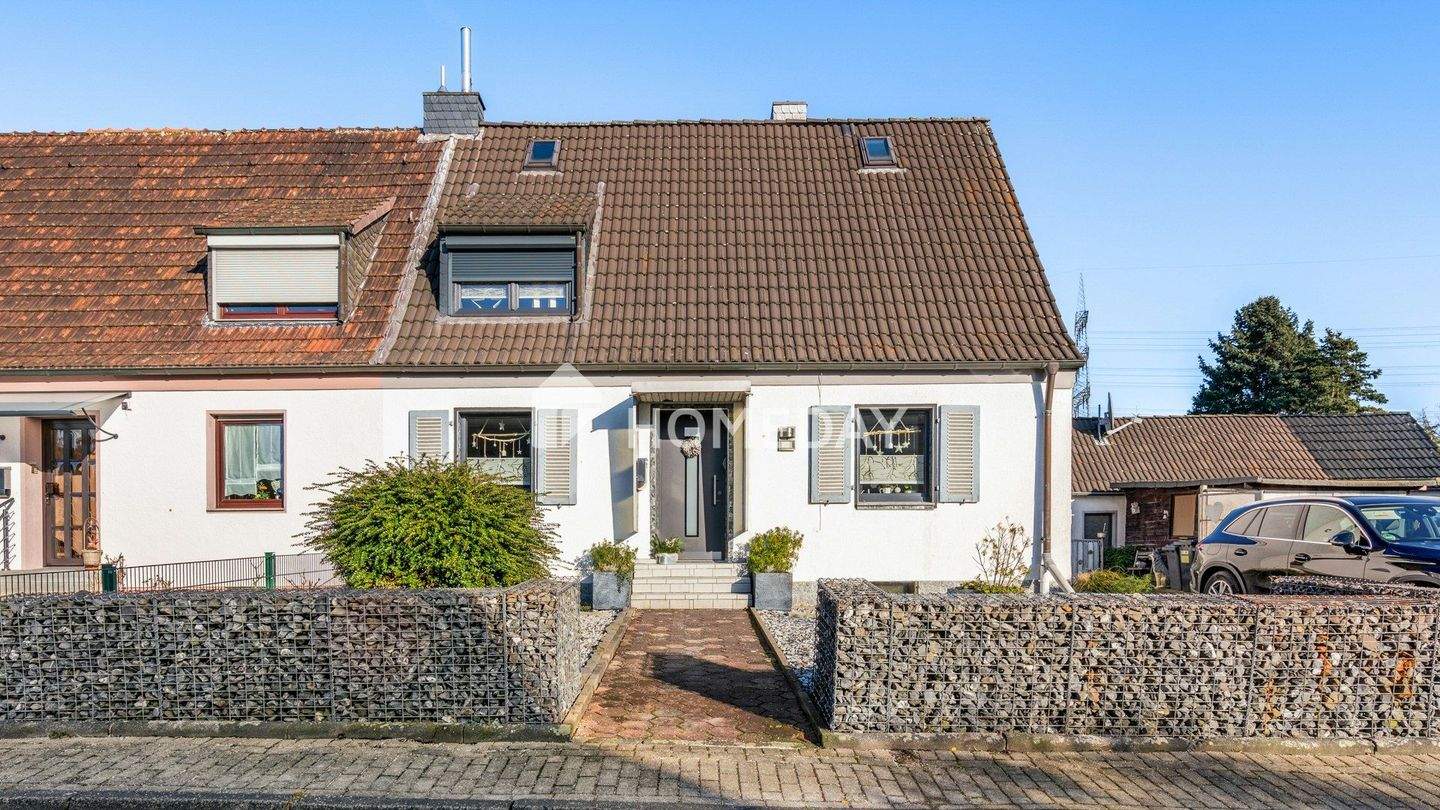 Großzügiges Wohnen mit Kamin, Garten und zusätzlichem Nebengebäude – Bochum – Bild 1 von 9