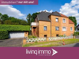 Doppelhaushälfte mit separatem Wohnhaus, Garage, Garten und vielen Extras