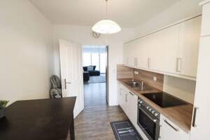 Moderne, gepflegte Wohnanlage mit fünf Wohneinheiten, Kellerräumen sowie Pkw-Stellplätzen – 49632 Essen (Oldenburg) – Vorschaubild 5