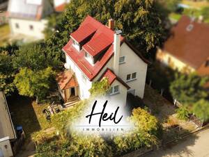 Freistehendes Einfamilienhaus mit Garten und Garage | Ausbaupotenzial I Siedlungslage