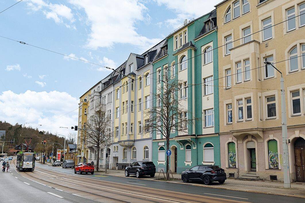 Wohnen und Entwickeln - Eigentumswohnung mit ausbaufähigem Dachgeschossrohling