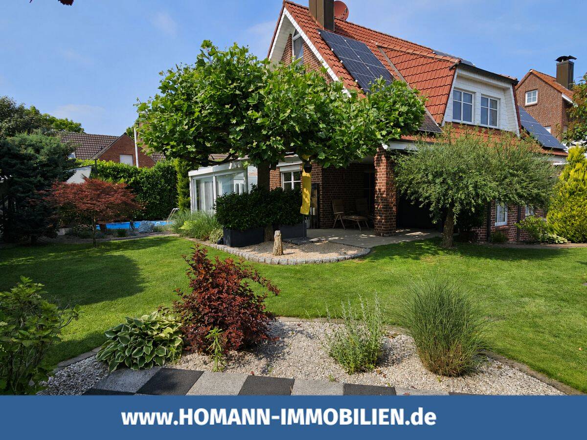 Modernes Einfamilienhaus mit Einliegerwohnung & Traumgarten in ruhiger Einfamilienhaus-Wohnlage