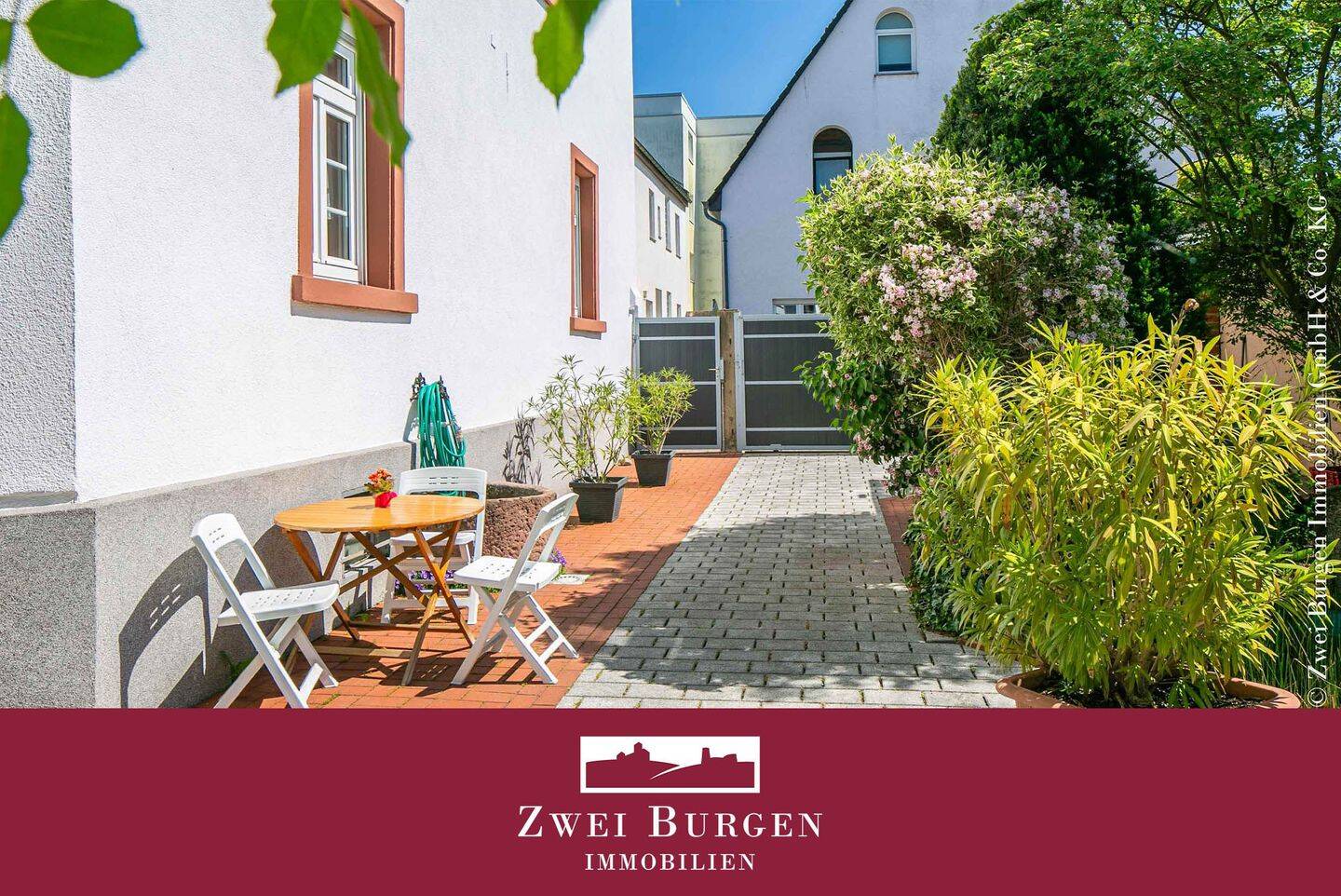 Einfamilienhaus nach WEG mit Laden und ELW mit herrlichem Gartenhof und Garage