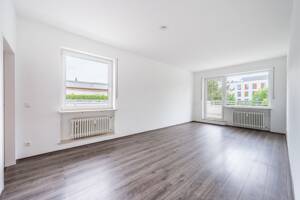AIGNER - Lichtdurchflutetes Penthouse mit umlaufender Dachterrasse im Fasangarten