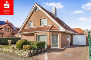 Bremen-Kattenesch: Freistehendes Einfamilienhaus mit 5 Zimmern mit Garten und Garage