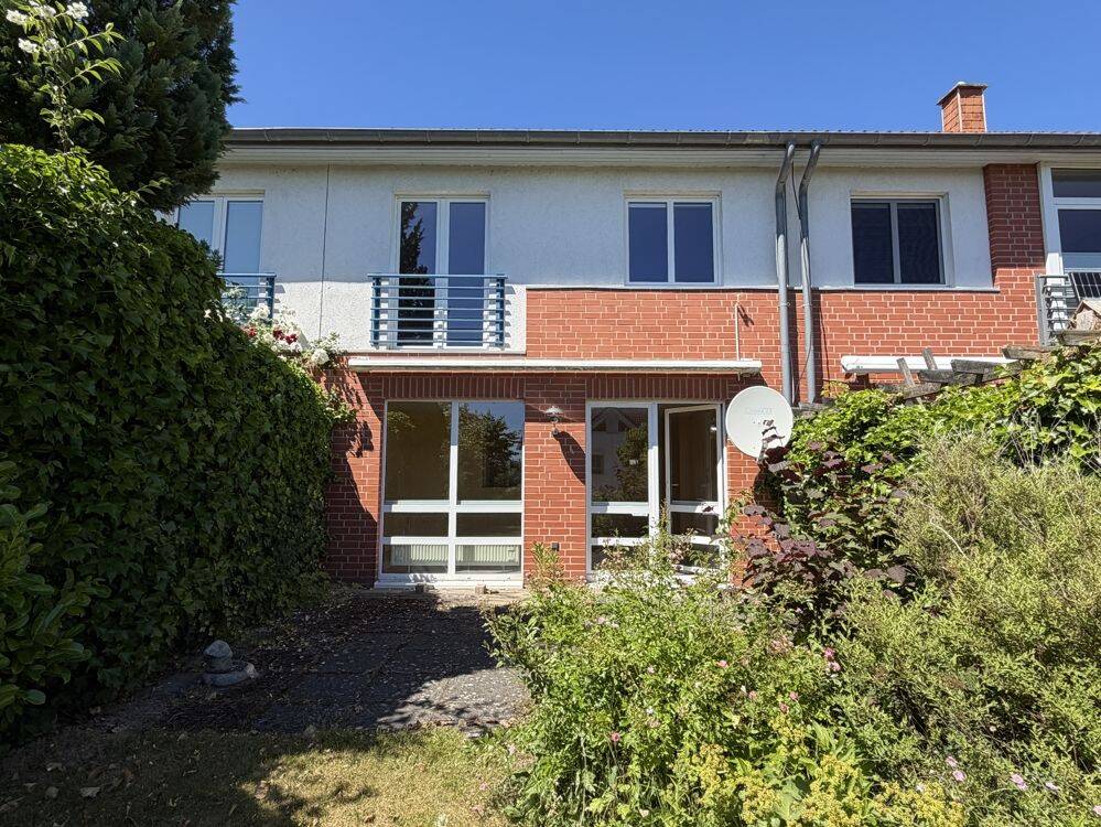 Modernes Reihenmittelhaus in beliebter Lage von Dänischenhagen mit Carport