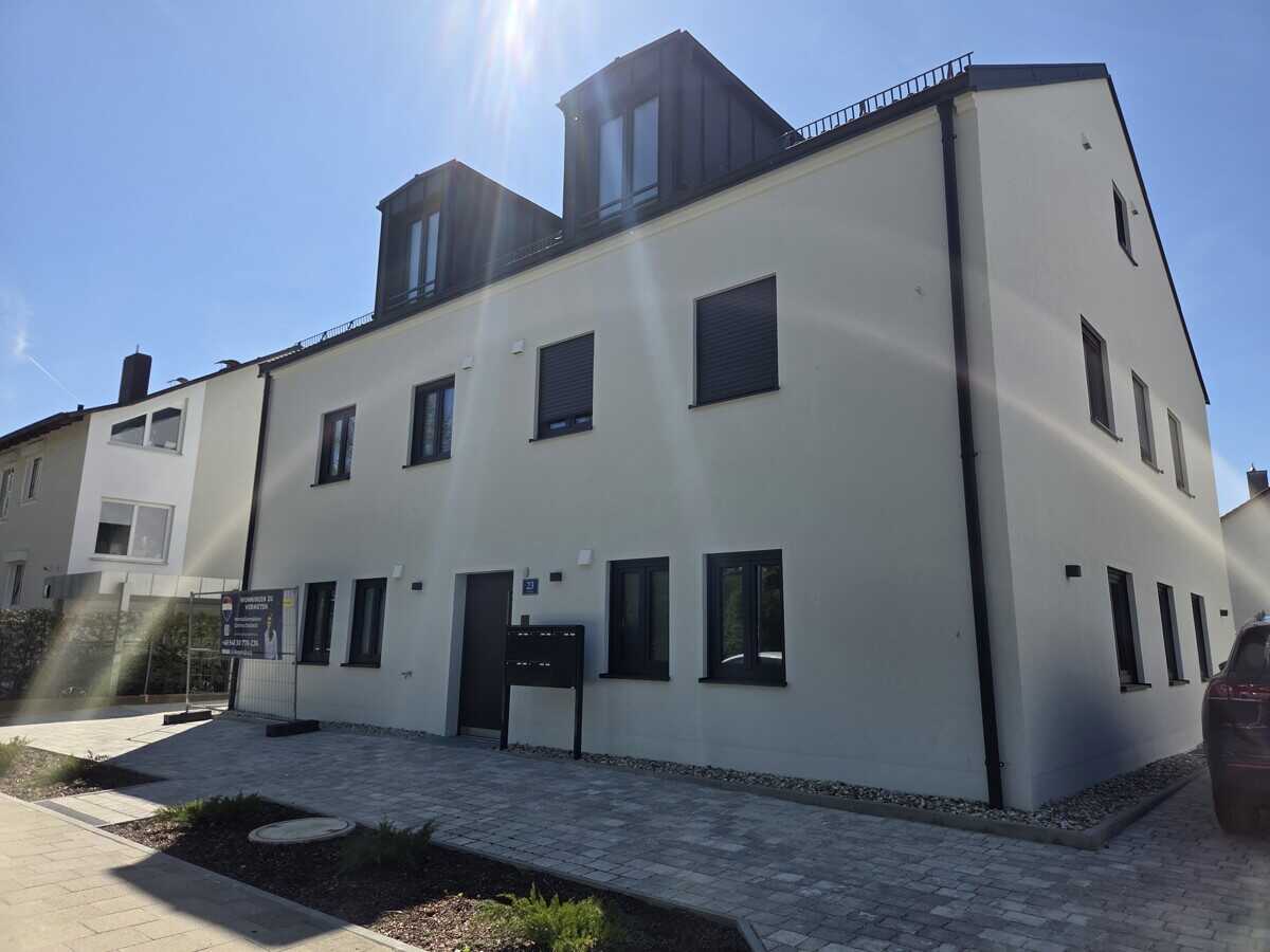 Erstbezug: Gemütliche Dachgeschosswohnung in bester Lage