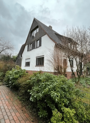 Charmantes Einfamilienhaus mit Wintergarten, viel Platz & großem Potenzial in zentraler Lage von Hasbergen – Hasbergen – Vorschaubild 2