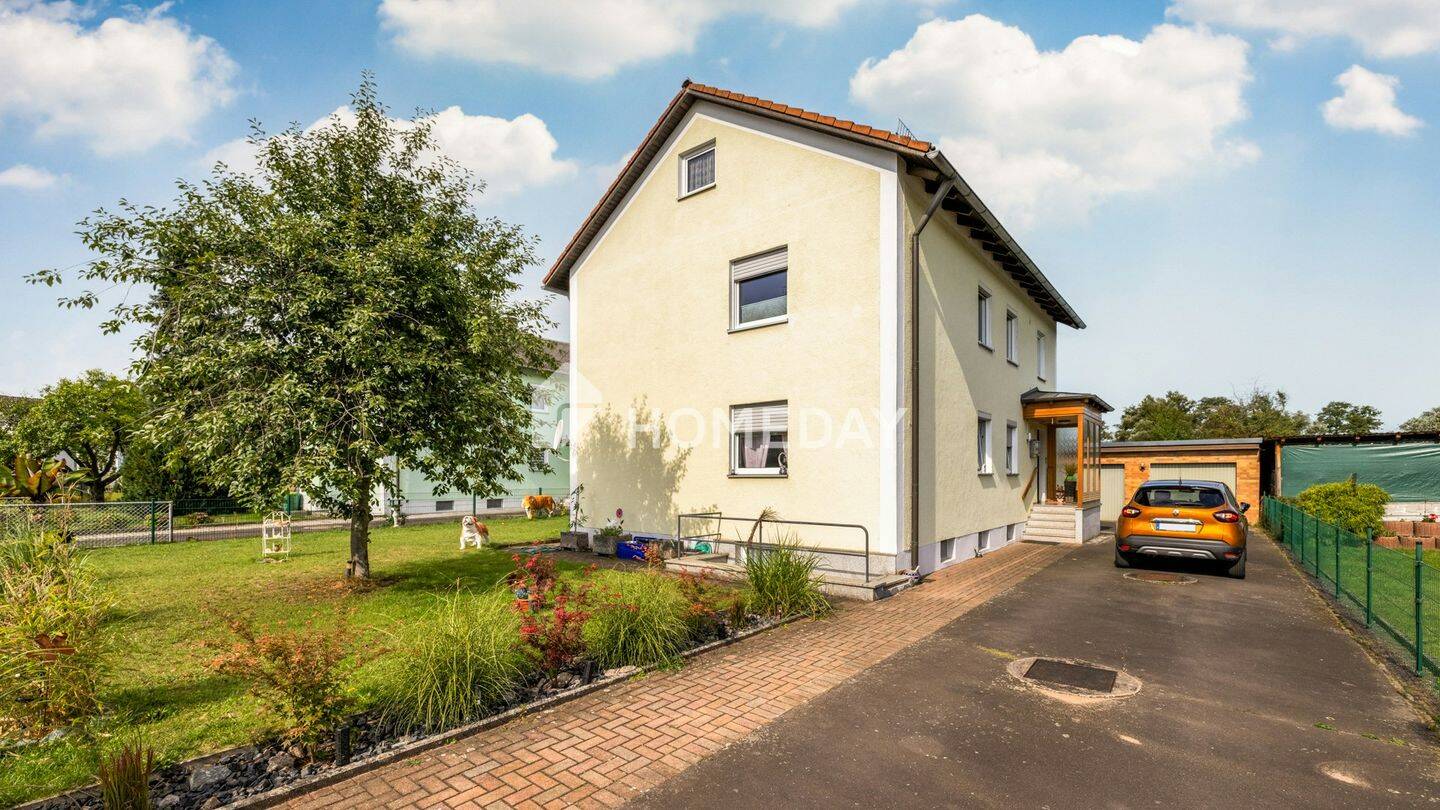 Leerstehendes Zweifamilienhaus  -  Wohnen und Vermieten unter einem Dach möglich