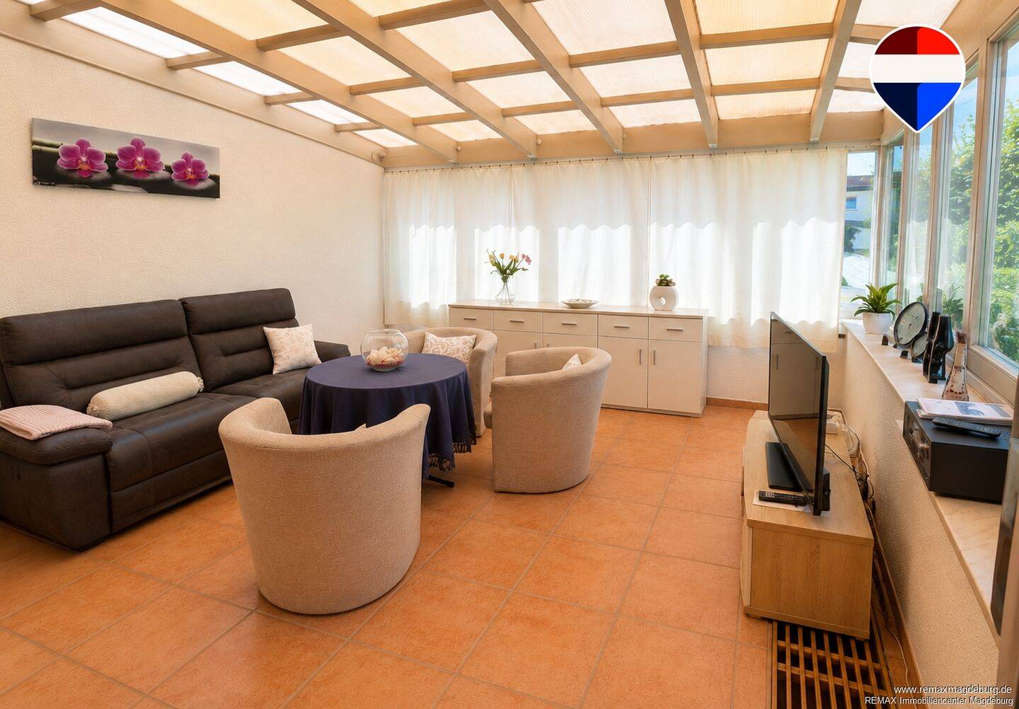 Wohnen mit Wohlfühlfaktor - Einliegerwohnung mit Wintergarten und Terrasse