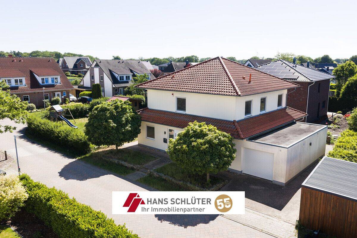 Schwanewede: Ansprechendes, großzügiges Einfamilienhaus mit Garage auf schönem Süd-West-Grundstück – Schwanewede – Bild 1 von 9