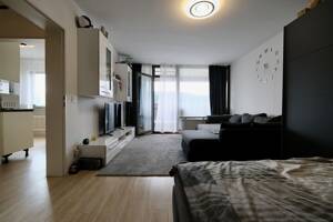 Rentabel vermietete Wohnung mit Balkon im 11. Stock