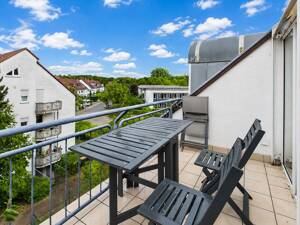 SCHWIND IMMOBILIEN - lichtdurchflutete 2-Zimmer-Wohnung mit Balkon und besonderer Architektur – 64289 Darmstadt – Vorschaubild 4