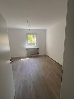 Sanierte Wohnung mit Einbauküche in einem 4-Familienhaus (EG rechts) – 26386 Wilhelmshaven – Vorschaubild 2