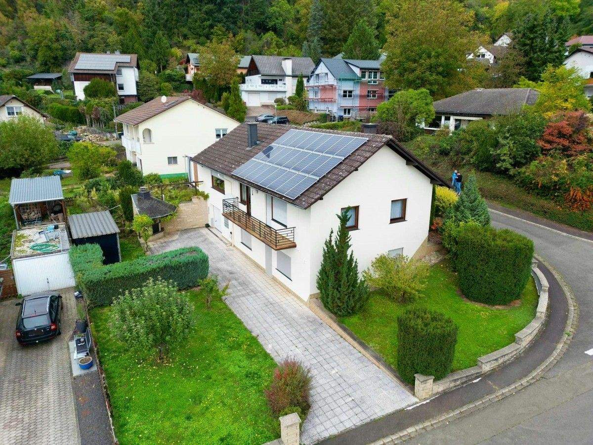 Preisreduzierung!! Freistehendes Einfamilienhaus mit ELW in toller Lage in Simmertal – Simmertal – Bild 1 von 9