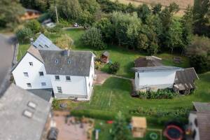 Gepflegtes Ein- bis Zweifamilienhaus mit PV-Anlage auf großem Grundstück in Ortsrandlage – 55469 Nannhausen – Vorschaubild 5