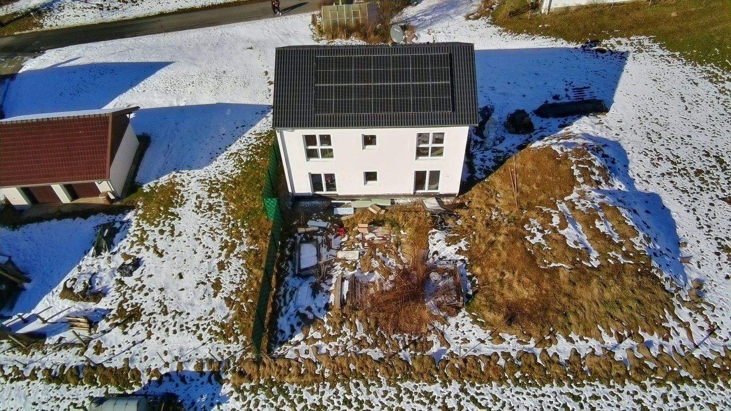 Modernes Fertighaus in Holzständerbauweise - Perfekt für Ihre individuellen Ausbauideen – Regen – Bild 1 von 9