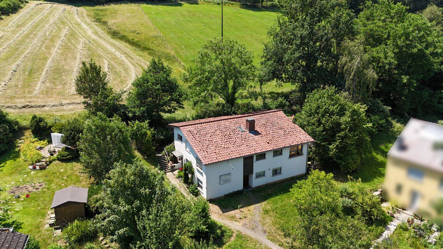 Architektonisches Wohnjuwel mit Einliegerwohnung - Großzügiges Zuhause in ruhiger Ortsrandlage