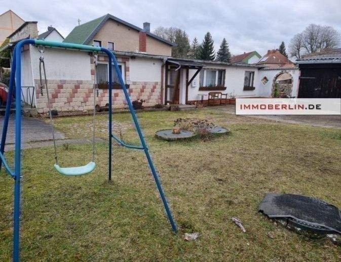 IMMOBERLIN.DE - Attraktives Mehrfamilienhaus & Bungalow in idealer Lage – Fürstenberg/Havel – Bild 1 von 6
