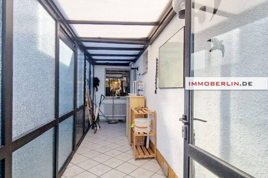 IMMOBERLIN.DE - Gepflegtes Reihenhaus mit beschaulichem Garten in Ruhelage – Berlin – Bild 1 von 9