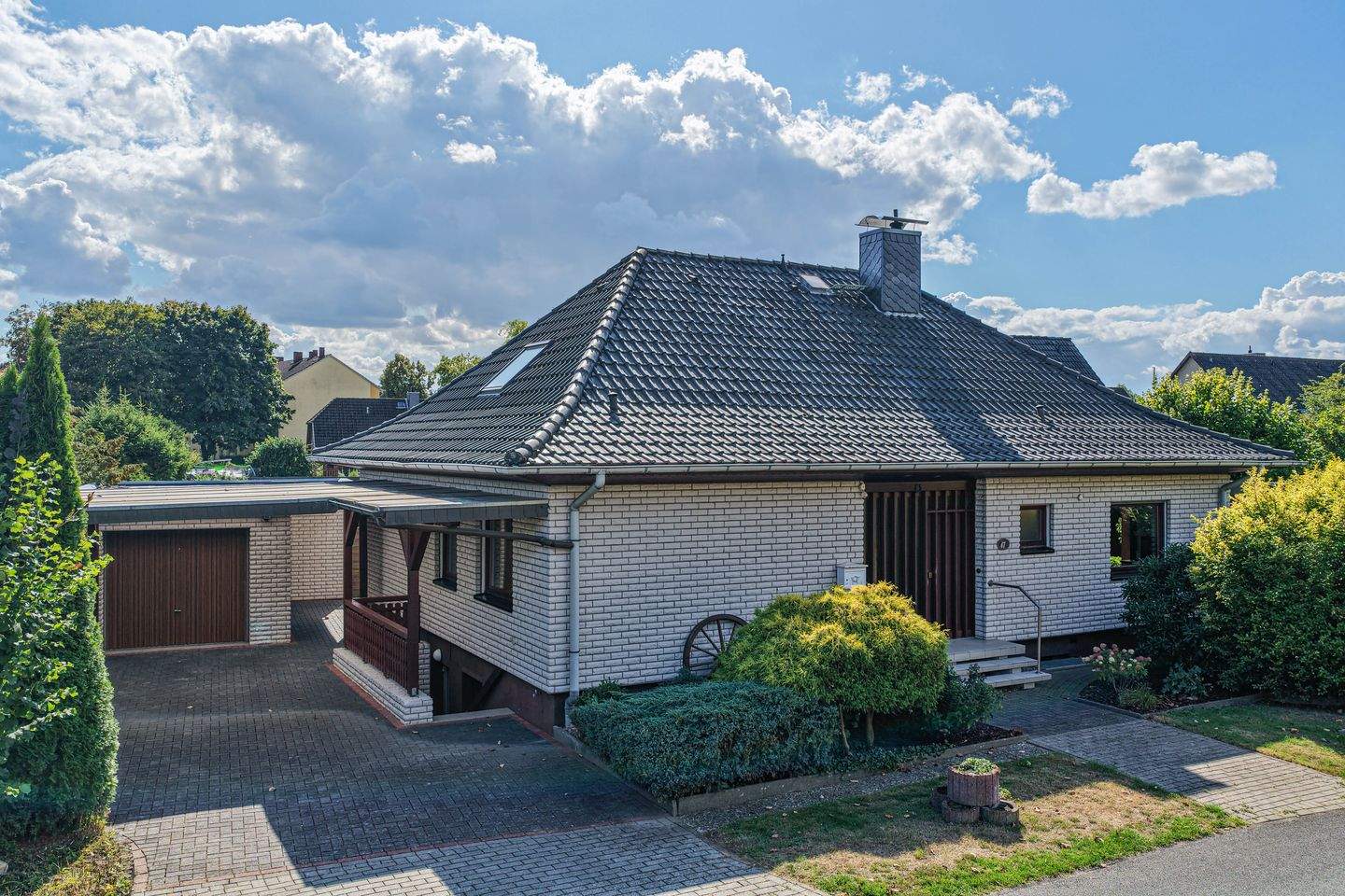 Bungalow mit Garage & imposanter Terrasse in schöner Lage** – Munster – Bild 1 von 9