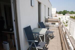 Loftartiges Wohnen - Sonnige, neuwertige Wohnung über den Dächern von Trudering