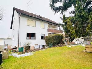 Gepflegtes Mehrfamilienhaus mit Süd-West-Garten in ruhiger Bestlage