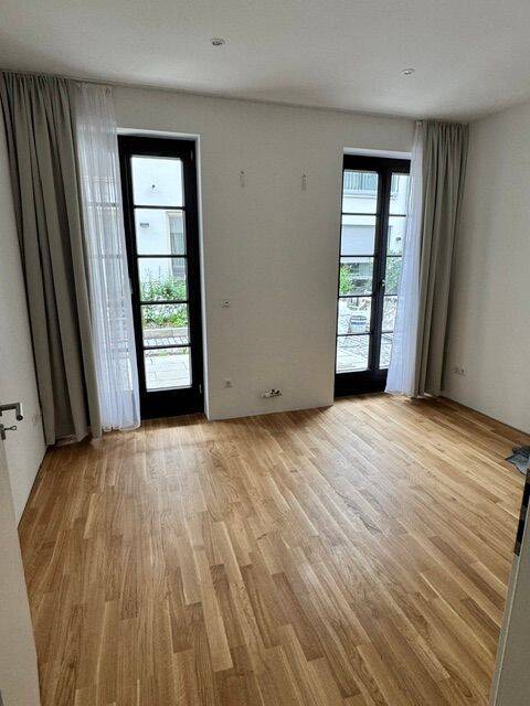 Erstbezug nach Kernsanierung! Traumhafte EG-Terrassen-Wohnung zum Innenhof