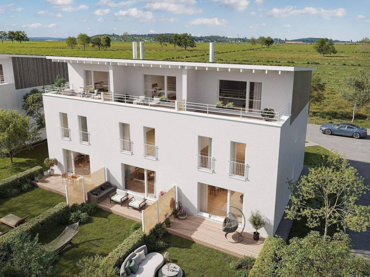 Am Sonnenhang - Eigenheim auf Mietkostenniveau: Moderne Stadthäuser nur 30 Minuten von Würzburg entfernt – 97084 Würzburg – Bild 1 von 8