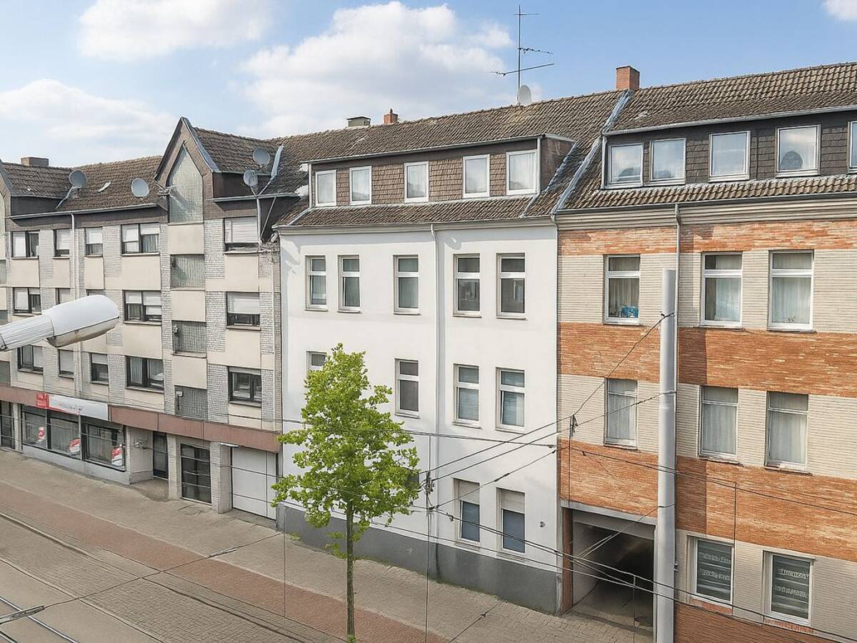 Gepflegtes Mehrfamilienhaus mit sechs Wohneinheiten und fünf Garagen in zentraler Lage – 45891 Gelsenkirchen – Bild 1 von 6