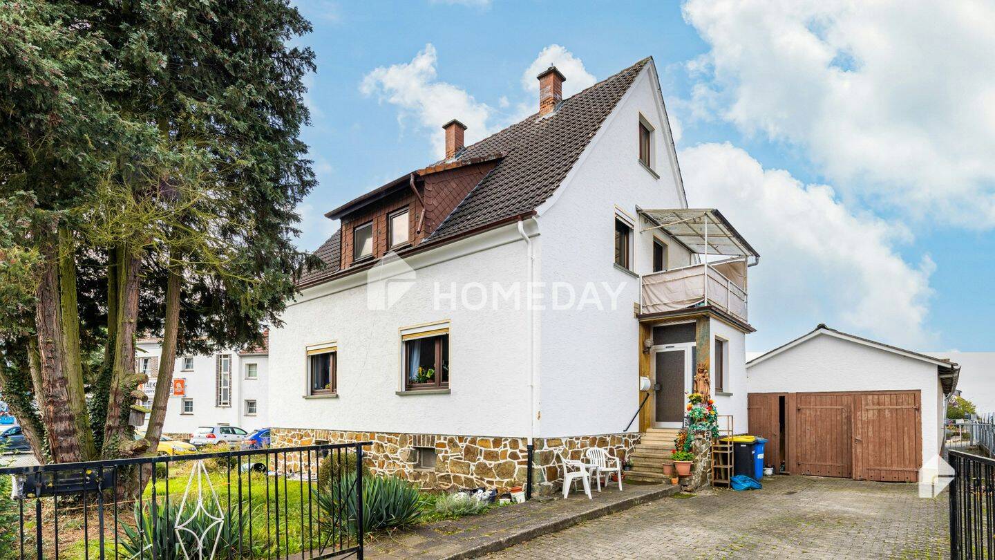 Einfamilienhaus mit großem Garten in Schwalbach – Schöffengrund – Bild 1 von 9