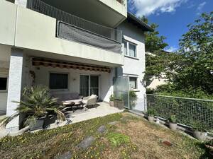 Familienfreundliche 4-Zimmer-Eigentumswohnung mit Terrasse, Gartenanteil, Garage und Keller