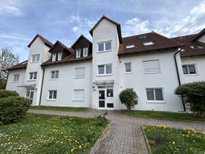 Vermietete 2-Zimmer-Eigentumswohnung mit Terrasse und Tiefgaragenstellplatz