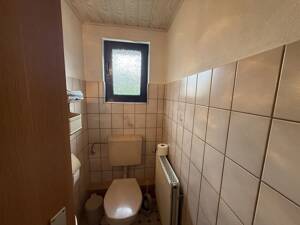 Dörverden-Westen: Gemütliches Einfamilienhaus mit Anbauten, Kaminofen und unterkellertem Garagenhaus – 27313 Dörverden – Vorschaubild 9