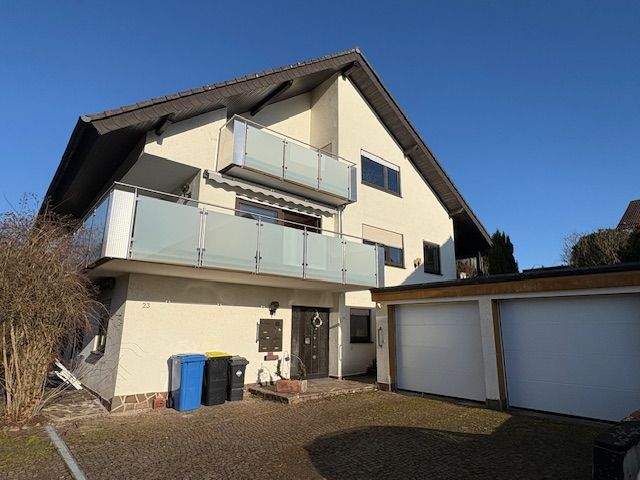 Attraktives 2-Familienhaus in idyllischer Lage mit tollem Grundstück & Ausbaupotential – Waldbrunn – Bild 1 von 9