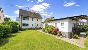 METZ IMMOBILIEN - Dreifamilienhaus mit Potenzial und großem Grundstück