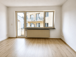 Mehrfamilienhaus mit 7 Wohnungen, 2 Gewerbeeinheiten und 3 Garagen – 47799 Krefeld – Vorschaubild 2