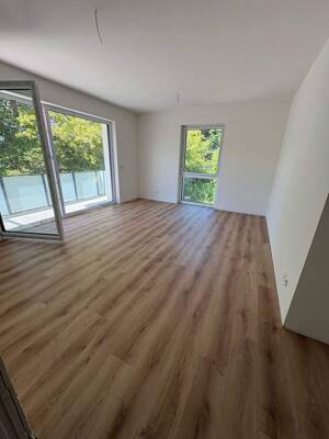 Exklusive Neubauwohnung mit 3-Zimmern, S/W-Balkon, Designbelag, HWR, Keller, Tiefgaragenstellplatz