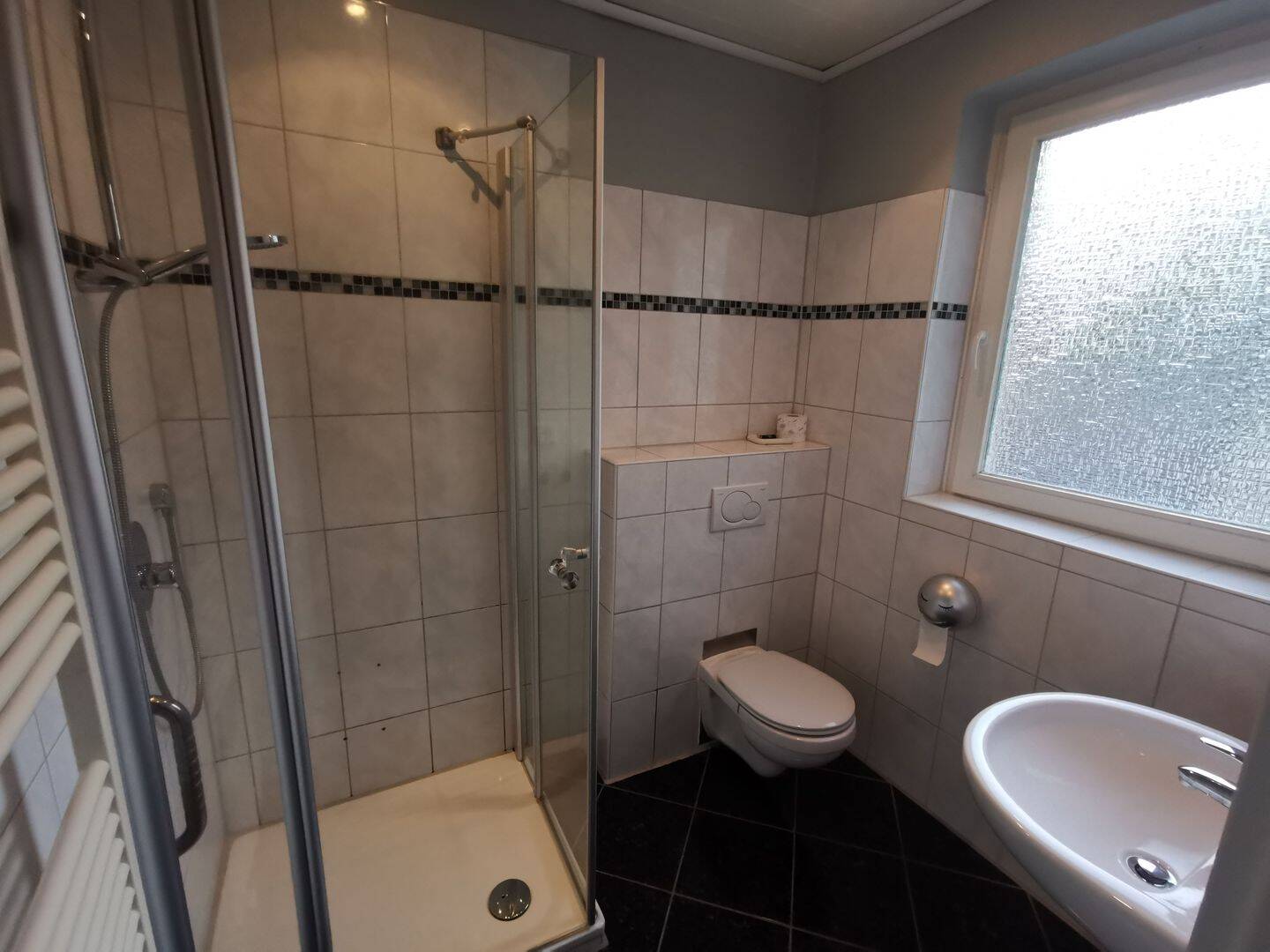 Erdgeschosswohnung mit Terrasse