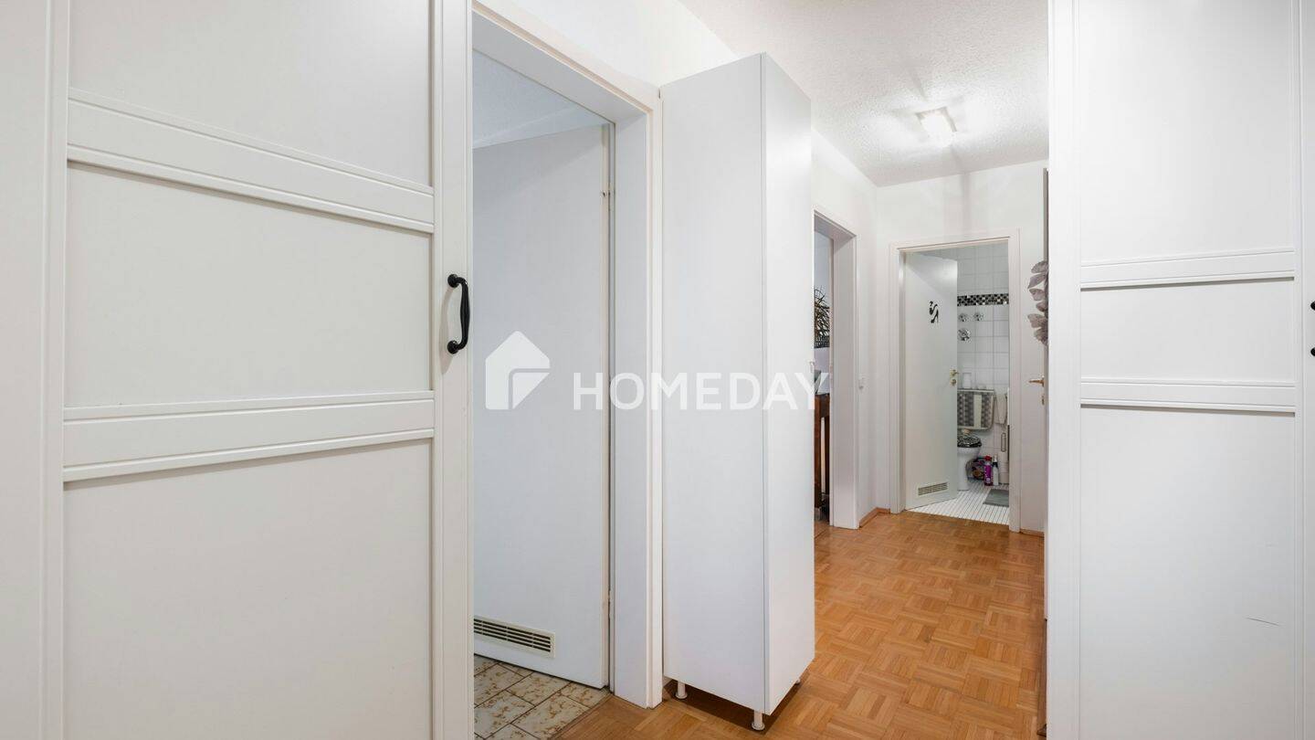 Urbaner Rückzugsort mit Weitblick: Etagenwohnung mit Balkon und Tiefgarage – München – Vorschaubild 9