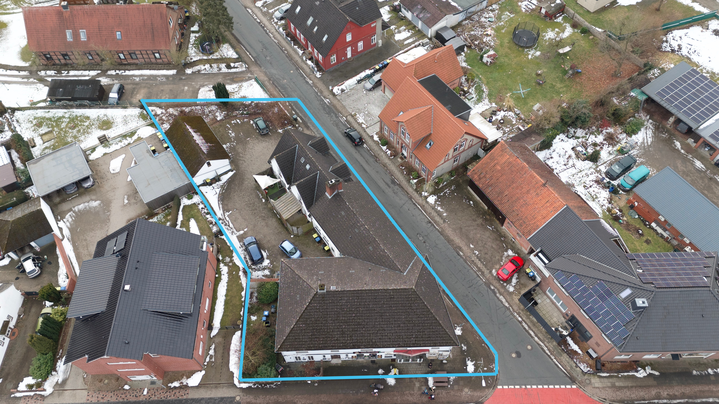 Renditestarke Kapitalanlage: Gepflegtes Mehrfamilienhaus mit 5 Wohneinheiten & 3 Gewerbeeinheiten ! – Scheeßel – Bild 1 von 9