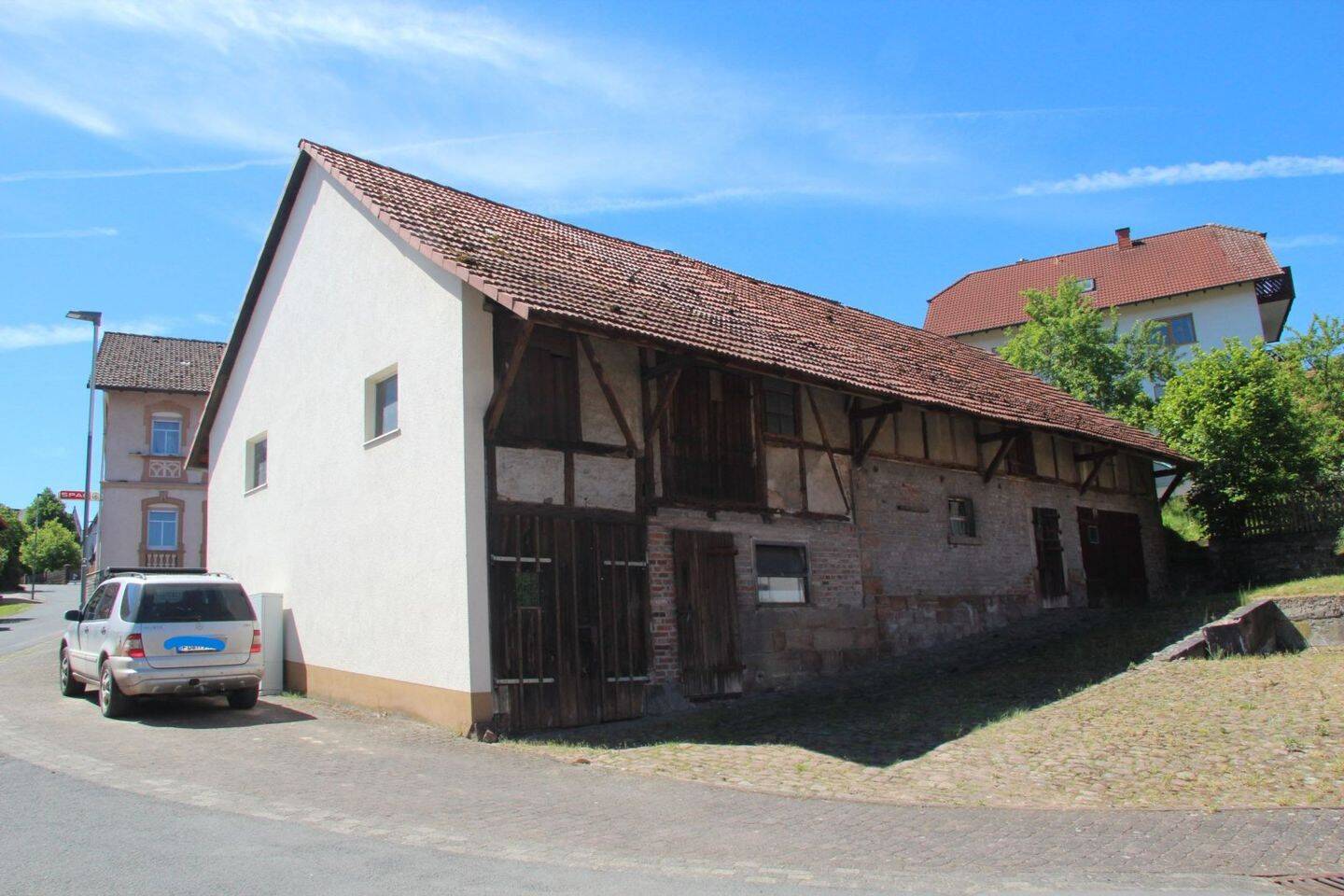 Eindrucksvolles Wohnhaus aus dem Jahr 1904 mit ehemaligem Spar-Laden, Scheune und Garage – Burghaun – Vorschaubild 7